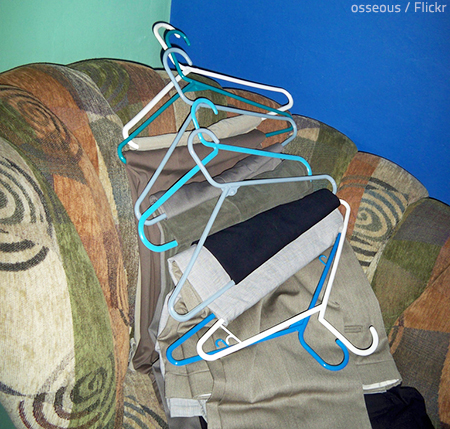 Moving clothes on hangers is time-saving trick.