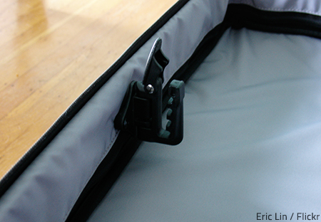 Garment bags offer a safe and easy way to move hanging clothes.