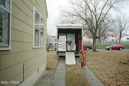 Loading a fridge into a moving truck