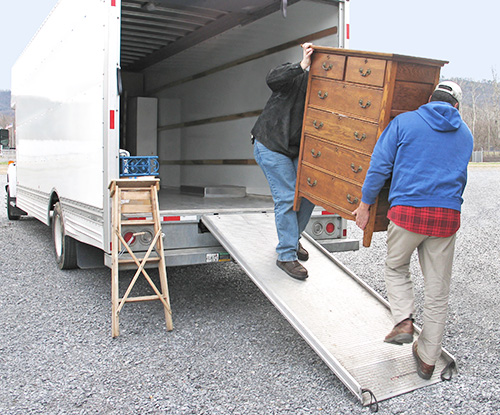 Ensure your safety when loading a moving truck.