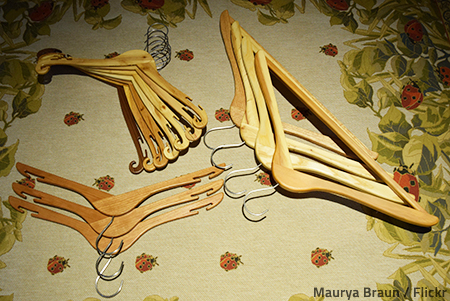 The best way to pack hangers for moving is to group them by size and material and wrap them together.